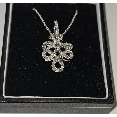 336 - A lovely 9ct Gold and Diamond set Pendant.