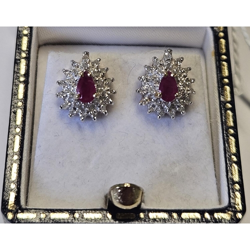 337 - A fabulous pair of 18ct Gold, Diamond and Ruby cluster Earrings.