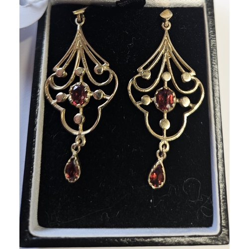 339 - A pair of 9ct Gold and Ruby set Earrings.