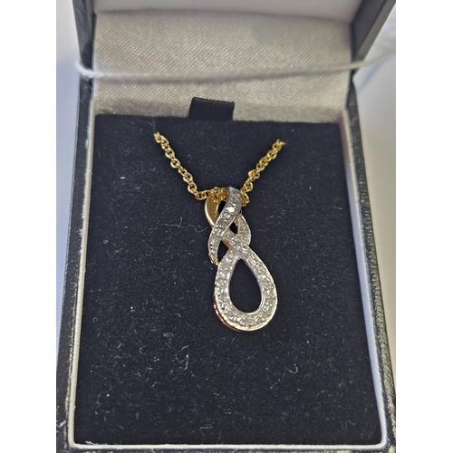 372 - A Diamond set Pendant and Chain.