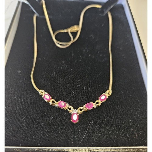 385 - A lovely 9ct Gold, Diamond and Ruby Necklace.