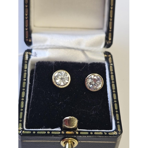 386 - A pair of 9ct Gold stud Earrings.