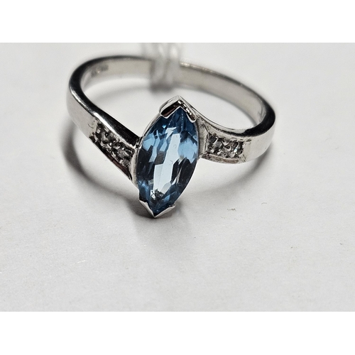 382 - A 9ct White Gold, Diamond and Topaz Ring, size N.