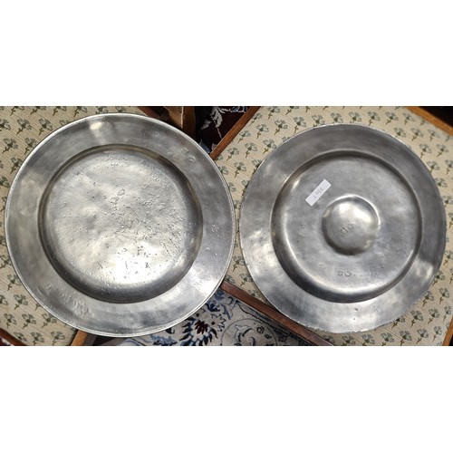 586 - Four early Pewter Plates. D 29 cm approx.