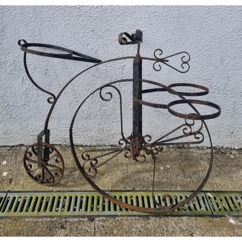 1322 - A Vintage Metal Penny farthing style  garden Plant stand. 
H 85 cm approx.