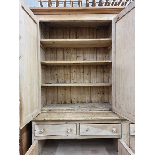 143 - A Magnificent 19th Century four door stripped Pine Food Larder Press of large size. W 236 x D 70 x H... 