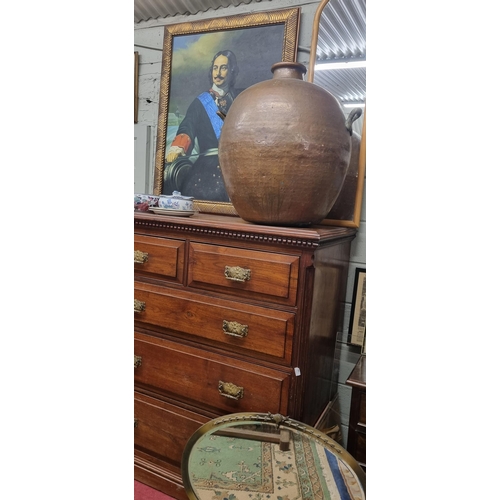 167 - An extremely large Copper bulbous Urn with panel beaten outline and twin lifting handles. H 71 cm ap... 