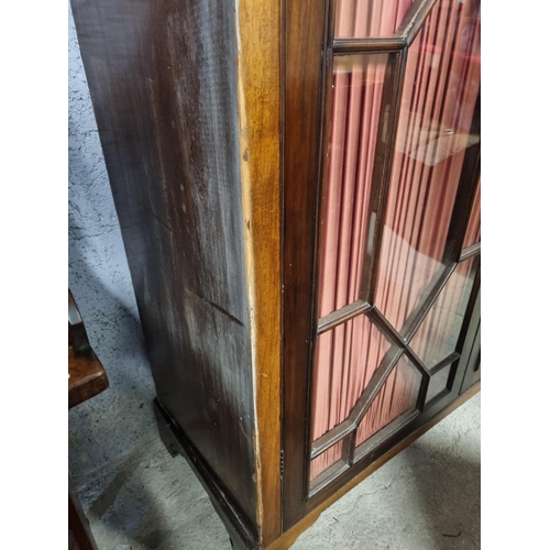 1182 - An extremely large 19th Century Mahogany two door Wardrobe with astragal glazed doors on bracket fee... 