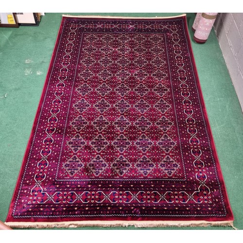 700A - A red ground Turkish Soft Full  Pile Carpet with central medallion design surrounded by borders and ... 