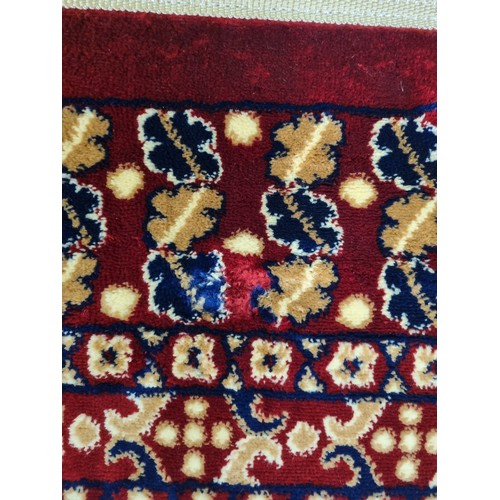 900B - A red ground Turkish Soft Full  Pile Carpet with central medallion design surrounded by borders and ... 