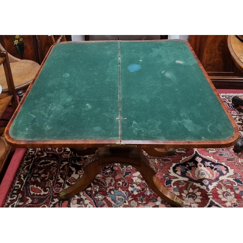 230 - A fantastic Regency Mahogany fold over Card Table on quatrefoil pedestal base and brass castors, rec... 