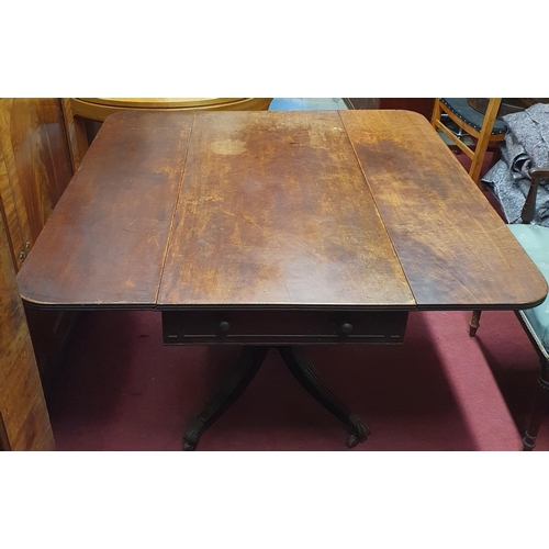 1295 - A 19th Century Pembroke Table with solid Mahogany top and brass claw castors (lacking end drawer).
H... 