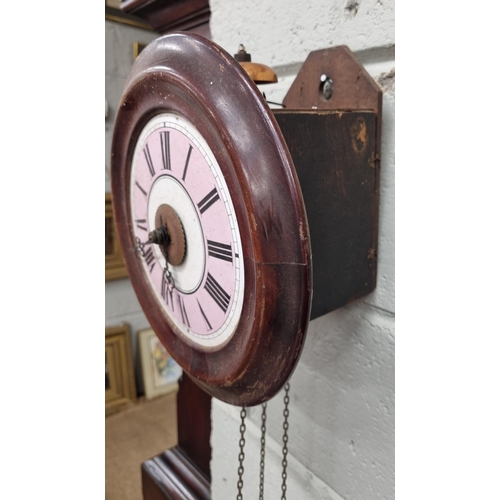 11 - A 19th Century postman's Clock with weights. D 26 cm approx.