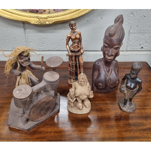 13 - A quantity of African Figures.