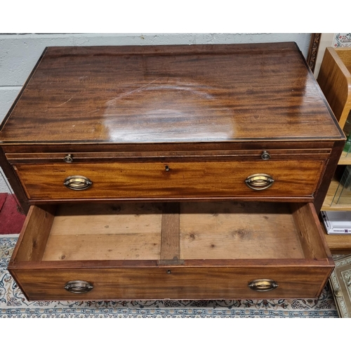 14 - A lovely Regency and Mahogany inlaid Chest of small proportions with a brushing slide top and bracke... 