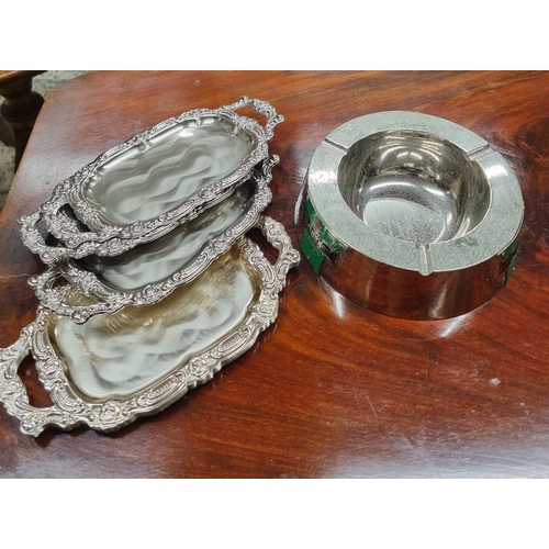 17 - A quantity of branded Ashtrays along with a good quantity of Silver Plated receipt/change trays.