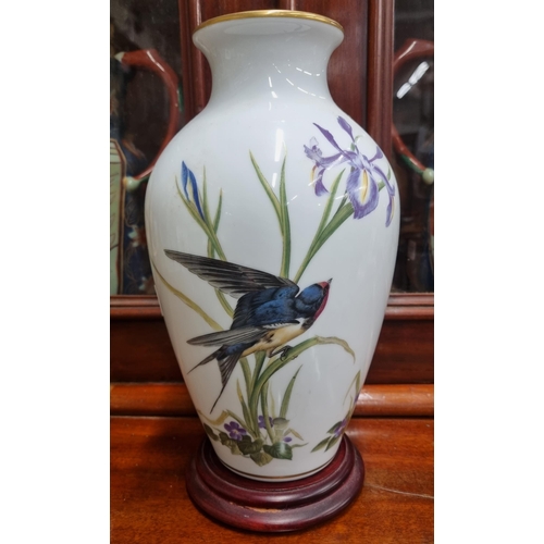 21 - A Limited Edition Franklin Porcelain 'The Meadow bird' Vase. H 30 cm approx.