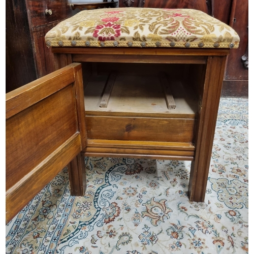 51 - A late 19th early 20th Century Walnut Piano Stool with lift up lid. 44 x 40 x H 51 cm approx.