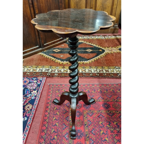 65 - A good 19th Century Rosewood and veneered lamp Table with barley twist shaft and tripod support. D 3... 