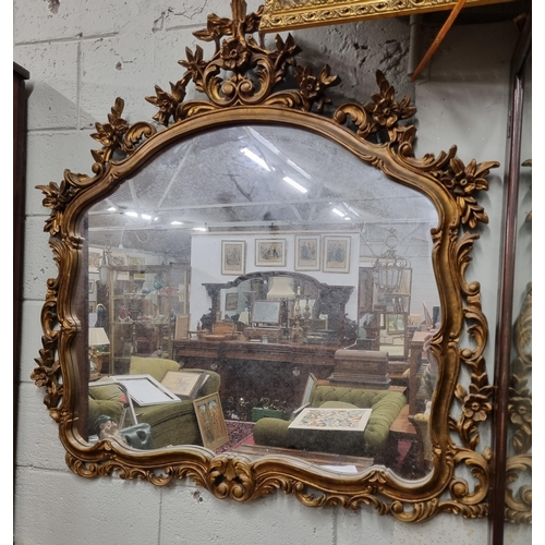 69 - A good Timber and plaster gilt over mantle Mirror with highly moulded outline. W 119 x 116 cm approx... 