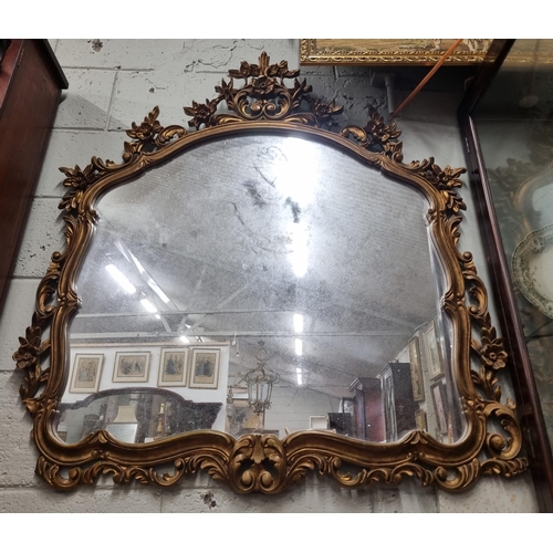 69 - A good Timber and plaster gilt over mantle Mirror with highly moulded outline. W 119 x 116 cm approx... 