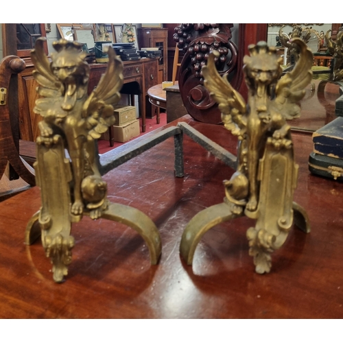 85 - A good pair of 19th Century Fire Dogs depicting gargoyles. H 22 cm approx.