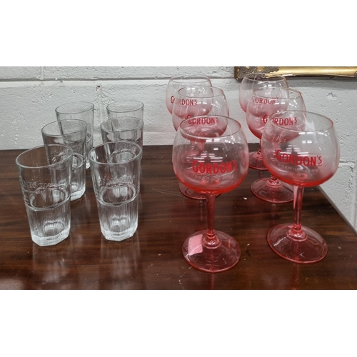 86 - A set of Gordons Premium Pink Gin Glasses along with a set of six Jameson Irish Whiskey water glasse... 