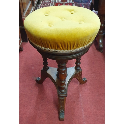 99 - A 19th Century rise and fall Piano Stool. D 33 cm approx.