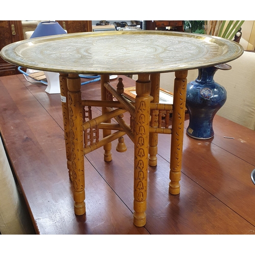 893 - A late 19th early 20th Century foldup tray top Table with highly etched brass top. D 67 x H 52 cm ap... 