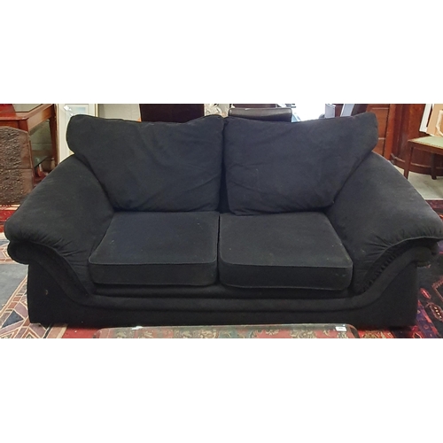 895 - Two, two seater black upholstered Couches. W 183 cm approx.