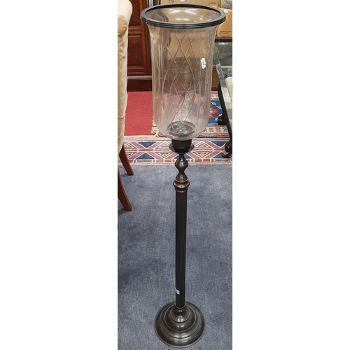 903 - A Metal columned Uplighter with glass shade.