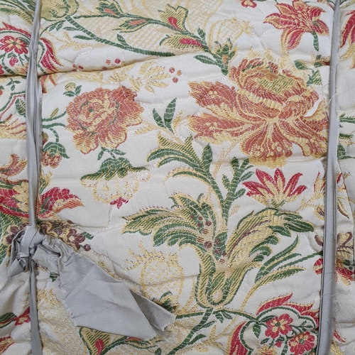 906 - A good floral cream ground single bedspread.