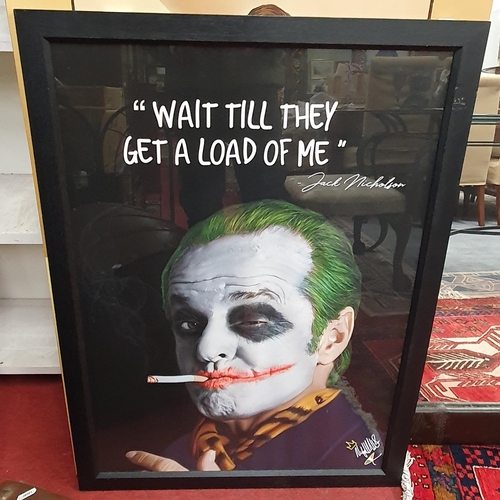 915 - A coloured Print of Jack Nicolson as 'The Joker'. 'Wait till they get a load of me'. Signed LR. 67 x... 