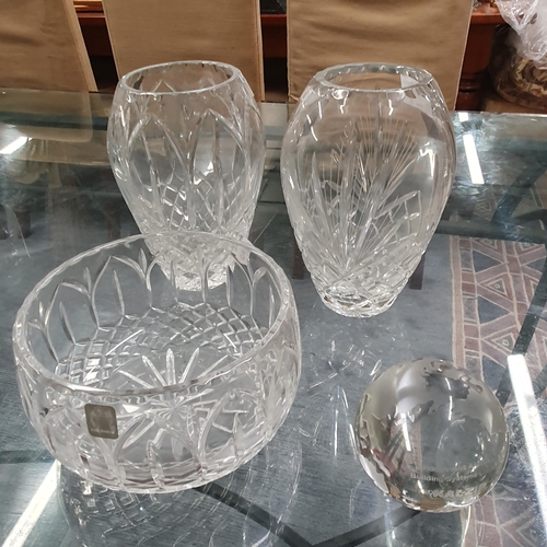 923 - A quantity of Crystal Vases and Bowls along with a pair of glass vases.