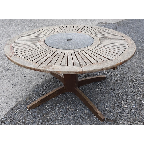 951 - A Circular Garden Table with Granite Lazy Susan center piece along with 6 fold up timber Chairs with... 