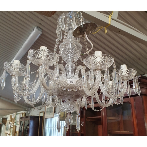 890 - A large Crystal eight branch Chandelier with crystal drops. Drop 70 x W 65 cm approx.