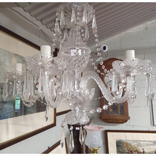 891 - A five branch Crystal Chandelier with crystal drops. D 60 x W 55 cm approx.