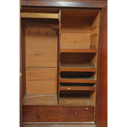 975 - A Large 19th Century Mahogany and Veneer 3 Door Wardrobe with fitted interior.
H 215 x 220 x 70 cm a... 