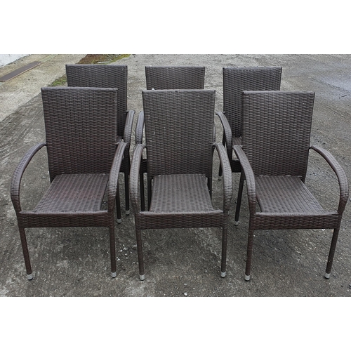 981 - A Set of six Stackable  metal framed  Rattan Style Patio Chairs.