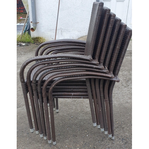 981 - A Set of six Stackable  metal framed  Rattan Style Patio Chairs.