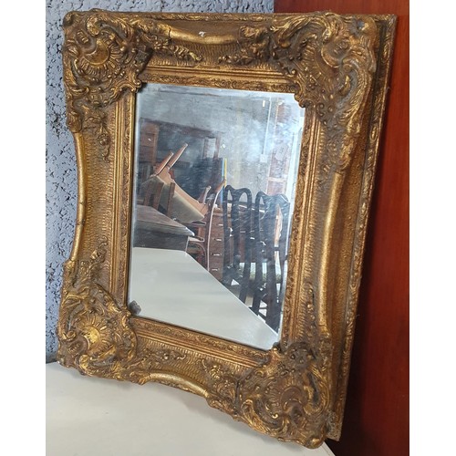 978 - An Ornate Gilt framed Bevelled Mirror.
H 62 x 50 cm approx.