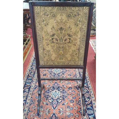 978A - A 19th Century Mahogany framed Tapestry Fire Screen. H 112  x W 52 cm approx.