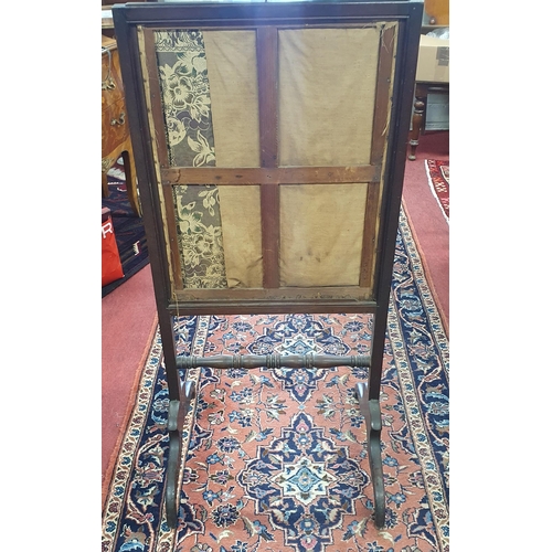 978A - A 19th Century Mahogany framed Tapestry Fire Screen. H 112  x W 52 cm approx.