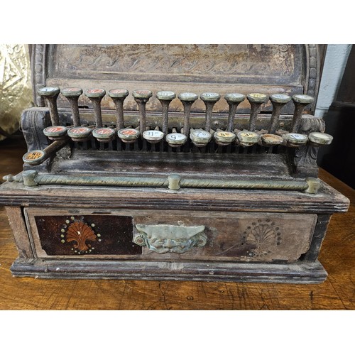 940A - A late 19th Century International Cash Register Cash Register with London retailer.