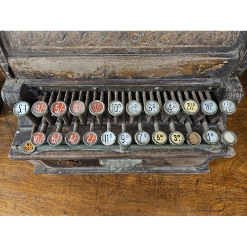 940A - A late 19th Century International Cash Register Cash Register with London retailer.