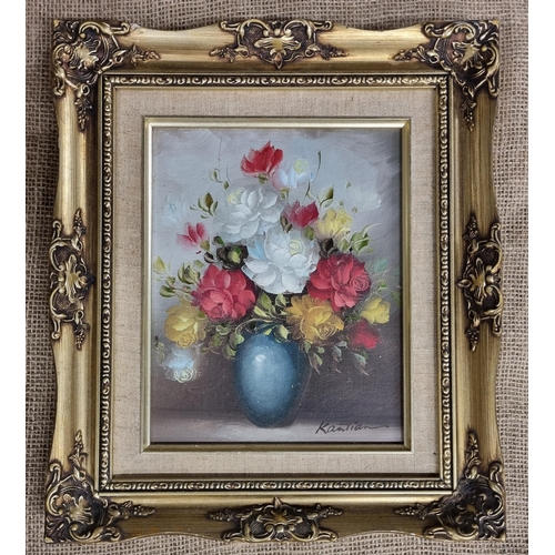 42 - A pair of 20th Century Oils on Canvas still life of flowers. Both signed. 24 x 19 cm approx.