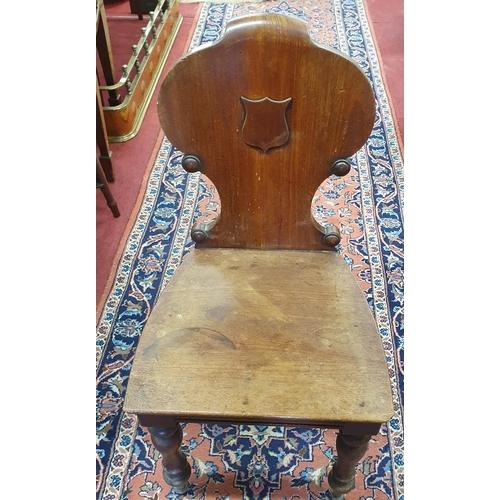 52 - A Pair of 19th Century Mahogany Hall Chairs with shield back on turned supports. W 45 x SH 43 x BH 8... 