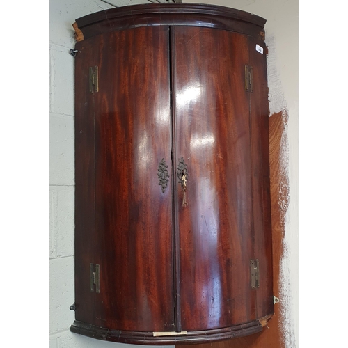 85 - An early 19th Century Mahogany two door wall mounted Corner unit. W 66 x H 101 cm approx.