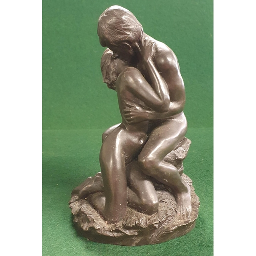 145 - A Bronzed Figural group of a loving couple. H 15 cm approx.