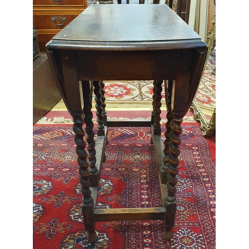 170 - An early 20th Century Oak gateleg Table on barley twist supports. 76 x 106 x H 72 cm approx.